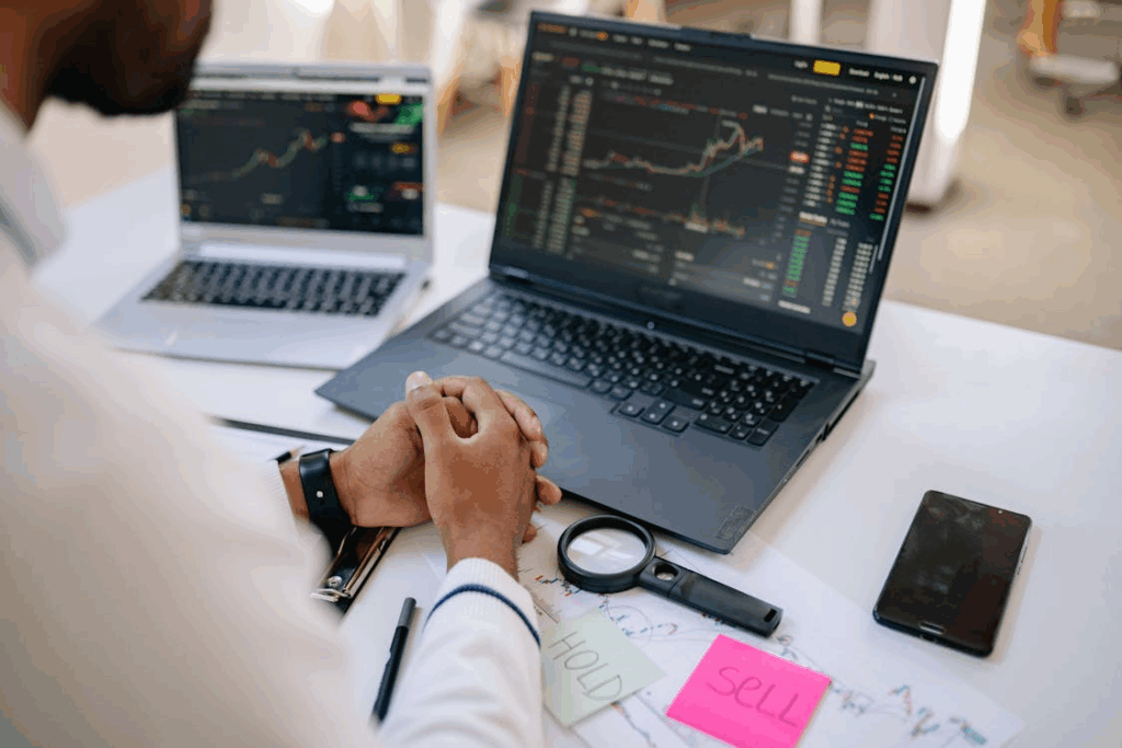 An investor deciding whether to hold or sell stocks during market volatility
