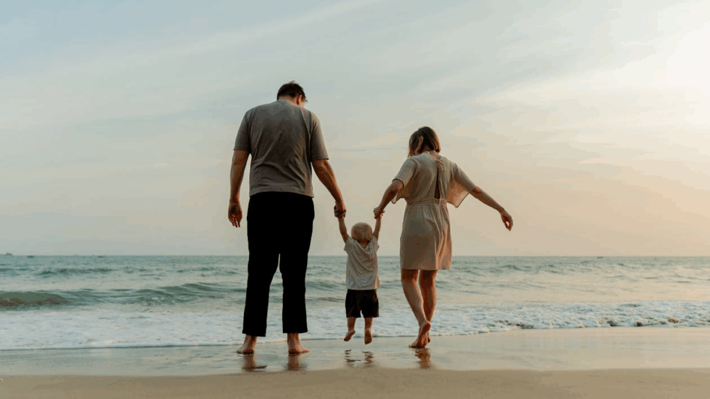 Happy family at the beach, a symbol of the luxury of security in family life